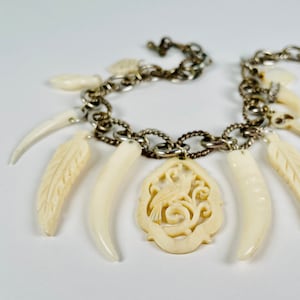 FUR AND FEATHER Vintage Bone and Resin Claw and Feather Pendants on a Hefty Vintage Chain