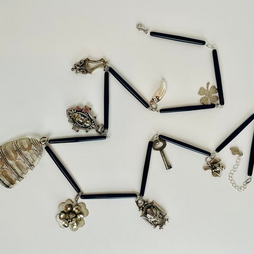 ARCHITECTURAL SALVAGE Navy Pipe Beads Meet Edwardian shops and Mid Century Pendants and Charms in This Long Structural Necklace