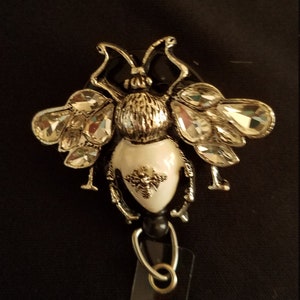 White Bug Badge Holder
