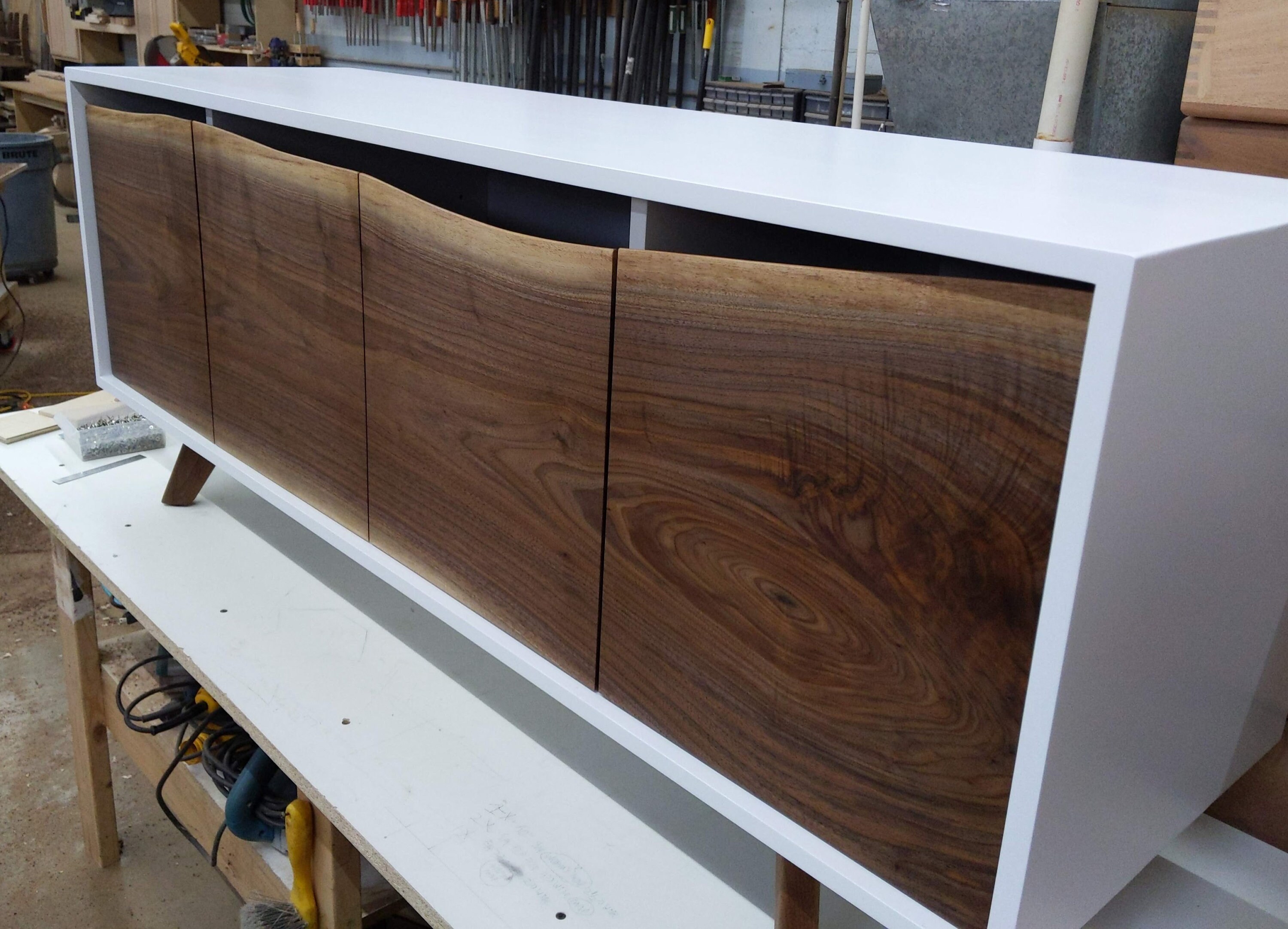 Unique modern credenza featuring live edge walnut doors Etsy