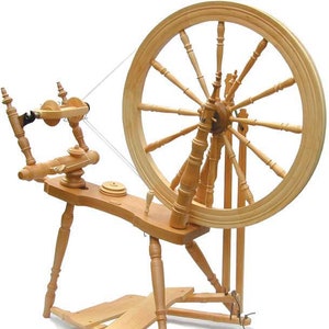 The Kromski Symphony spinning wheel offers not only a comfortable double treadle, but also four spinning ratios so you can spin the yarn of your choice. This graceful saxony  style spinning wheel comes complete with four bobbins and a tensioned lazy kate.
