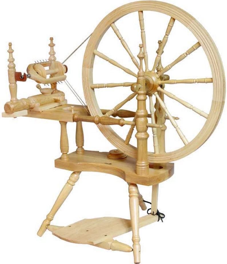 Shop Kromski Polonaise spinning wheel with single treadle  action. This spinning wheel comes complete with three bobbins, free standing upright lazy kate, threading hook and instructions. In stock now.