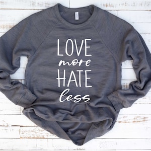 Love More Hate Less Shirt. Be Kind Shirt. Super Soft & Comfy Unisex Long Sleeve Sweatshirt. Humanity Shirt. Equality Shirt. More Love Shirt.
