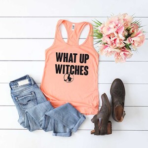 Halloween Shirt. What Up Witches Tank Top. Witch Shirt. Soft and Comfy Racerback Tank Top. Women&#39;s Halloween Tank Top. Halloween T-Shirt.