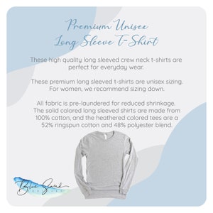 May include: A heather grey long-sleeved t-shirt with a crew neck. The text "Premium Unisex Long Sleeve T-Shirt" is at the top of the image. The text "These high quality long sleeved crew neck t-shirts are perfect for everyday wear." is below the title. The text "These premium long sleeved t-shirts are unisex sizing. For women, we recommend sizing down." is below the first paragraph. The text "All fabric is pre-laundered for reduced shrinkage. The solid coloured long sleeved shirts are made from 100% cotton, and the heathered coloured tees are a 52% ringspun cotton and 48% polyester blend." is below the second paragraph. The text "Blue Sand Textiles" is at the bottom of the image.