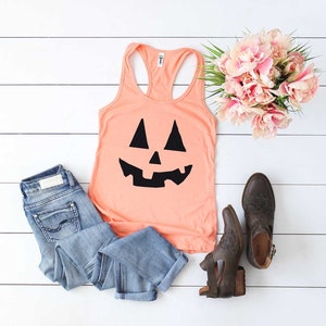 Halloween Shirt. Pumpkin Shirt. Jack-o-lantern Shirt. Soft and Comfy Racerback Tank Top. Women&#39;s Halloween Tank Top. Trick or Treating.