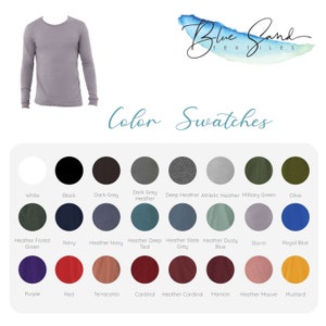 May include: Colour swatches for long-sleeved shirts in a variety of colours, including white, black, dark grey, heather grey, deep heather, athletic heather, military green, olive, heather forest green, navy, heather navy, heather deep teal, heather slate grey, heather dusty blue, storm, royal blue, purple, red, terracotta, cardinal, heather cardinal, maroon, heather mauve, and mustard.
