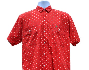 Vintage 80s or 90s red with painted print white polka dot short sleeve shirt by Benetton