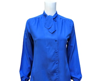 Vintage 70s or 80s blue blouse with off center buttons and tie at the neck