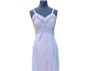 Vintage 50s or 60s pale pink nylon and lace dress slip