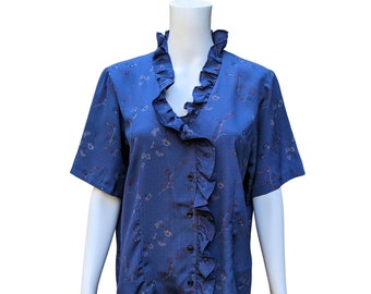 Vintage 1970s or 80s blue ruffled edge tissue thin polyester blouse