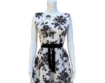 Vintage 1950s ivory white and black rose print fit and flare dinner dress with velvet belt