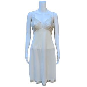 Vintage 70s or 80s beige nylon and lace dress slip
