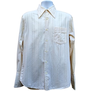 Vintage 1960s or 70s pale yellow textured fabric long sleeve men&#39;s dress shirt with French cuff