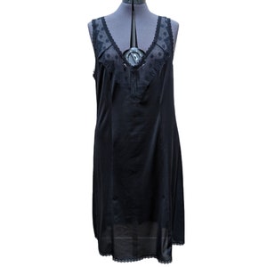 Vintage black 100% nylon with lace trim dress slip