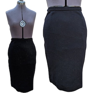 Vintage 1960s or 70s black knit wool pencil skirt, partly lined