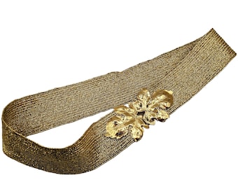 Vintage 1970s or 80s leaf buckle gold elastic belt