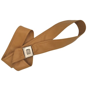 Vintage 1970s caramel brown faux leather with silver tone clip buckle belt, 43&quot; long