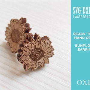 May include: A pair of wooden sunflower earrings, laser cut and ready to be assembled. The earrings are made of natural wood and feature a detailed sunflower design.