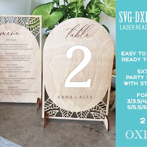 File di taglio dei numeri della tabella dell'arco floreale di Oxee, menu autoportante per matrimoni in legno, segno di nozze tagliato al laser