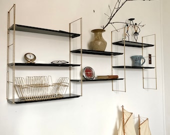 Vintage wall shelves in gold and black metal