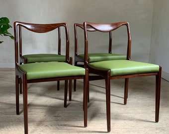 Vintage Scandinavian green faux leather chairs