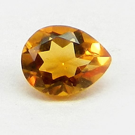 NATURAL MADEIRA CITRINE 11 MM TRILLION CUT