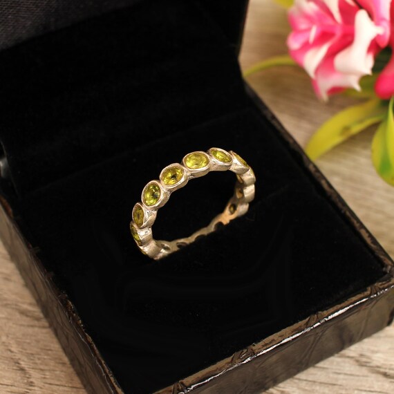 Peridot cheap eternity ring