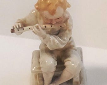 Japan Porcelain Figurine - Boy Playing Flute