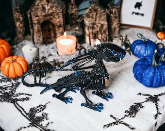 Blue Foil Leaf Black Griffin Skeleton