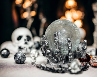 Cracked Glass Orb Skeleton Hand Decoration