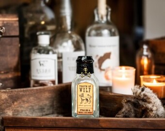 Wolf Tooth Potion Bottle