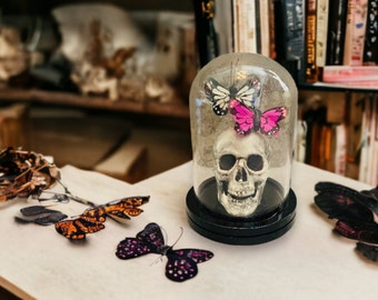 Skull with Ivory and Pink Butterflies in a Glass Dome