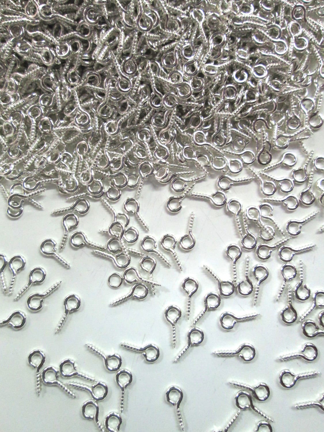 LLMSIX 300 Pieces Eye Hooks Screw Mini Metal Eye Pins for Jewelry Making  Small Eye Screws Silver Screw Eyes for DIY Art Crafts Jewelry Making  Findings Charm Bead Supplies (3 Different Sizes)