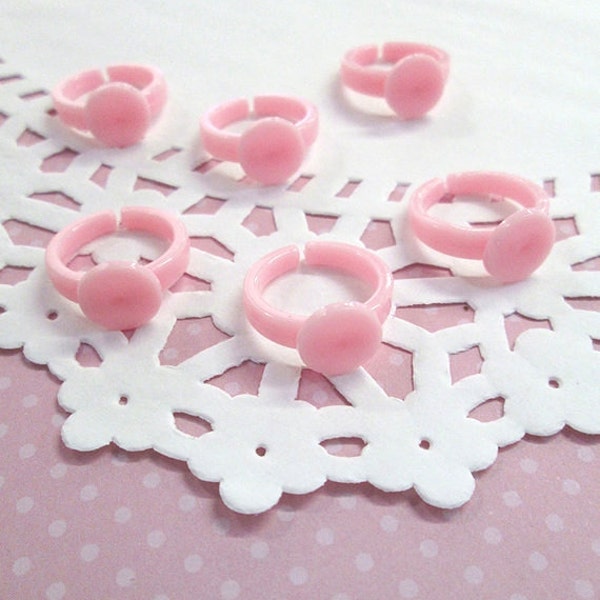 10 Kinderkleberinge, Kunststoffrohling rosa mit rundem 9 mm Klebepad, Größe 3, A292