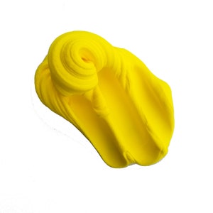May include: A bright yellow slime, a popular sensory toy, is shown in a close-up view. The slime is soft and malleable, with a smooth, glossy texture.
