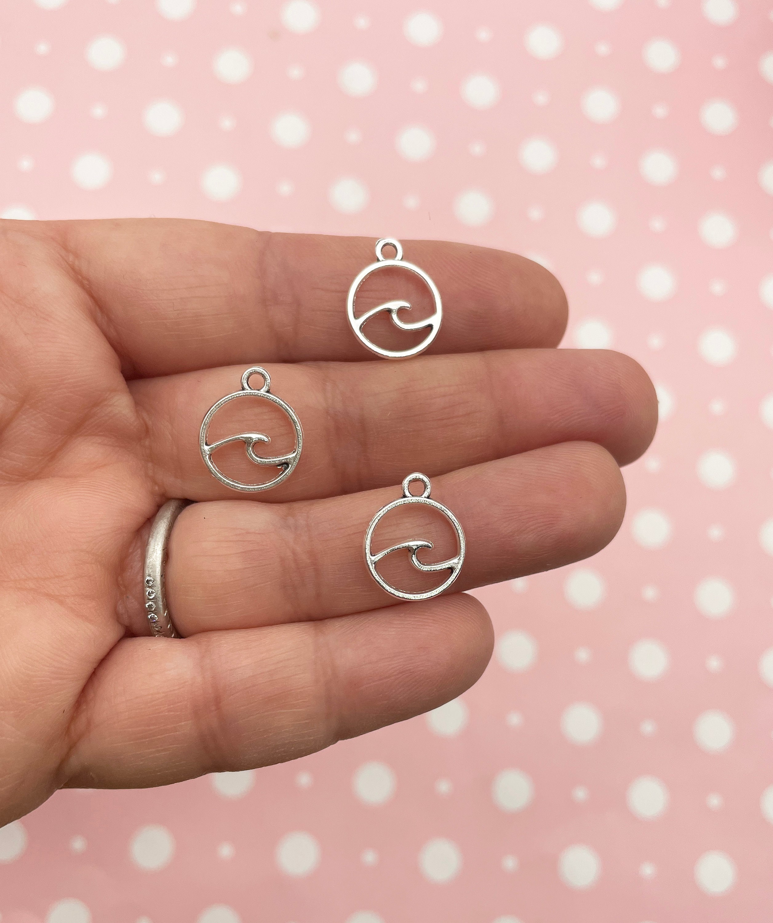 Silver wave shop charm