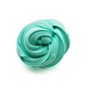 May include: A swirl of turquoise-colored slime, presented against a white background. The slime is soft and appears to be freshly made, with a smooth, textured surface. The image is a top-down view, highlighting the spiral shape.