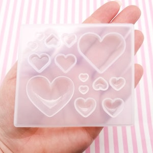 Molde de silicona con forma de corazón de 14 cavidades para cabujones, dijes y colgantes. Molde transparente para resina UV, arcilla, arcilla polimérica, Fimo, etc., Q164A