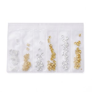 150-300 Assorted Tiny Gold and Silver Toned Nail Star Sea Shell and Bow Cabochon Charm Nail Kit L14