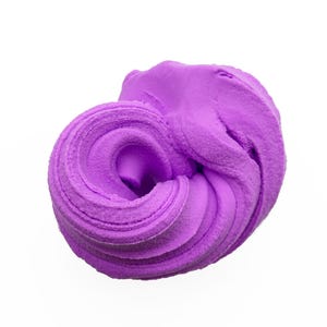 May include: A swirl of purple slime against a white background. The slime has a soft, textured appearance, with visible layers and a smooth, rounded shape. The color is a vibrant, medium purple.