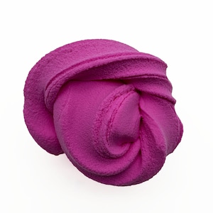 May include: A vibrant fuchsia fleece hat, tightly coiled and textured. The hat is a solid color, with visible seams and a soft, plush appearance. The hat is designed to keep the head warm.