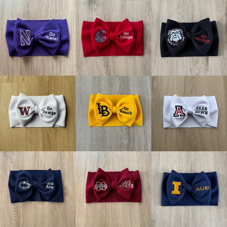 May include: Nine different coloured headbands with a bow and embroidered logos and text. The headbands are in the colours purple, red, black, white, yellow, maroon, and blue. The logos and text include: N Go Cats!, Go Cougs, Go Dawgs, W Go Dawgs, Go Beach, A BEAR DOWN, We Are, HAIL STATE, and I ILLINI.