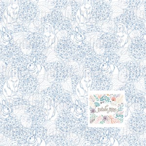 May include: A repeating pattern of white rabbits, Easter eggs, and blue hydrangea flowers. The design is outlined in a pale blue, creating a delicate and whimsical aesthetic. The lower right corner displays the text "Natalie Mine" within a floral frame.