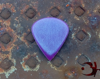 The Antagonist Scalpel - A slim, sharp plectrum made for precision, durability and comfort.