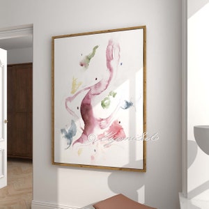 May include: Abstract watercolor painting in shades of pink, green, blue, and yellow. The painting features a large, flowing shape in the center, surrounded by smaller, scattered shapes.