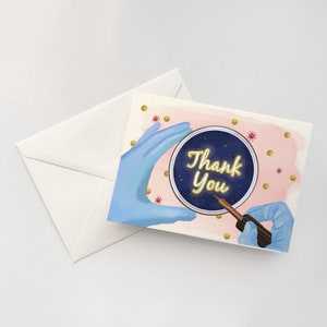 May include: A pink and white thank you card with a blue gloved hand holding a petri dish with the words "Thank You" in gold lettering. The petri dish has a blue background with gold stars.