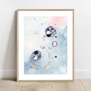 May include: Abstract watercolor painting with a blue, pink, and white background. The painting features a cluster of dark blue and gray circles, resembling bubbles, scattered across the canvas.