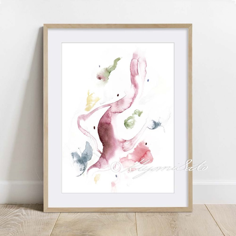May include: Abstract watercolor painting in shades of pink, red, green, and blue. The painting features a flowing, organic shape with smaller shapes scattered around it. The artist's signature is visible in the bottom right corner.