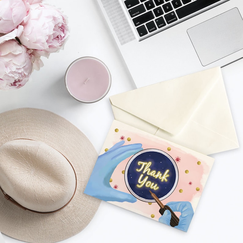 May include: A pink and gold thank you card with a blue gloved hand holding a petri dish with a glowing yellow "Thank You" message inside. The background is pink with gold dots and stars.